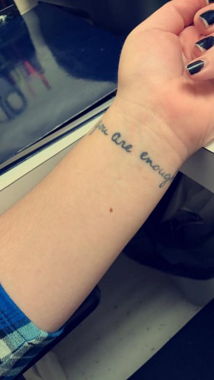 you are enough words tattooed on wrist