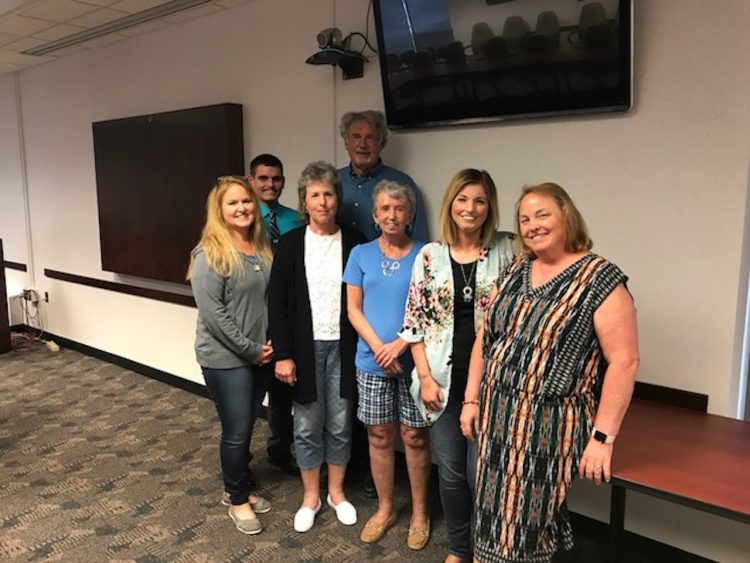 group of people giving a scleroderma talk at a university