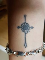 sunflower and cross tattoo