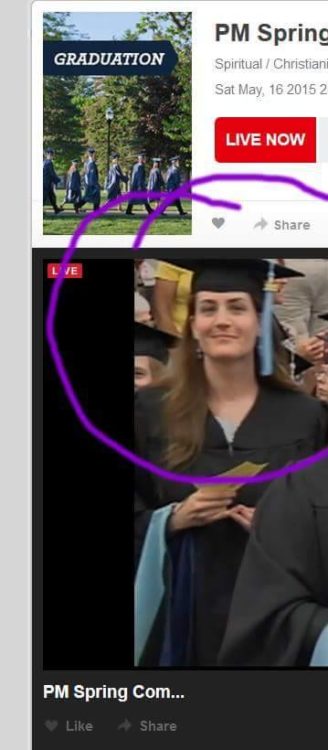 woman walking the stage after graduating with a master's degree