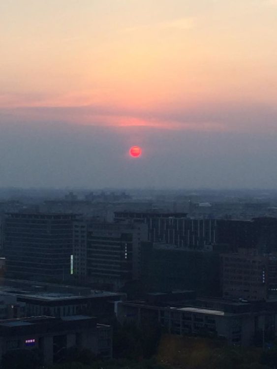 setting sun that looks like a fiery red ball