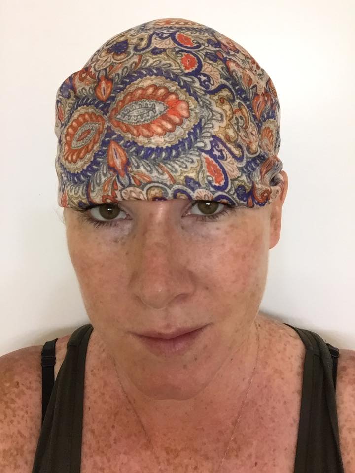 woman with melanoma cancer head wrap