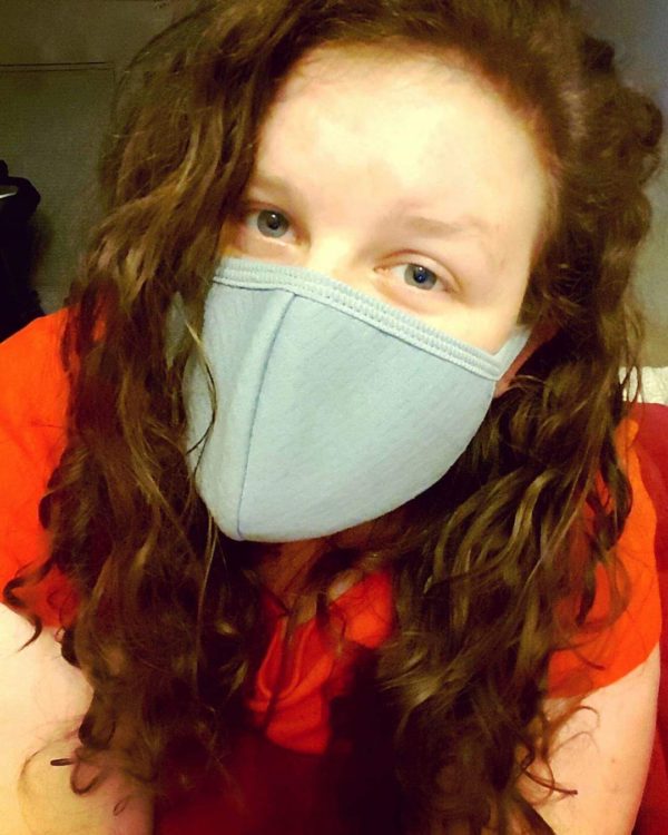 skin cancer woman wearing face mask