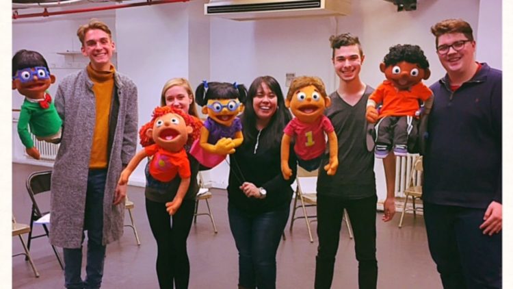 "Addy and Uno" cast with their puppets