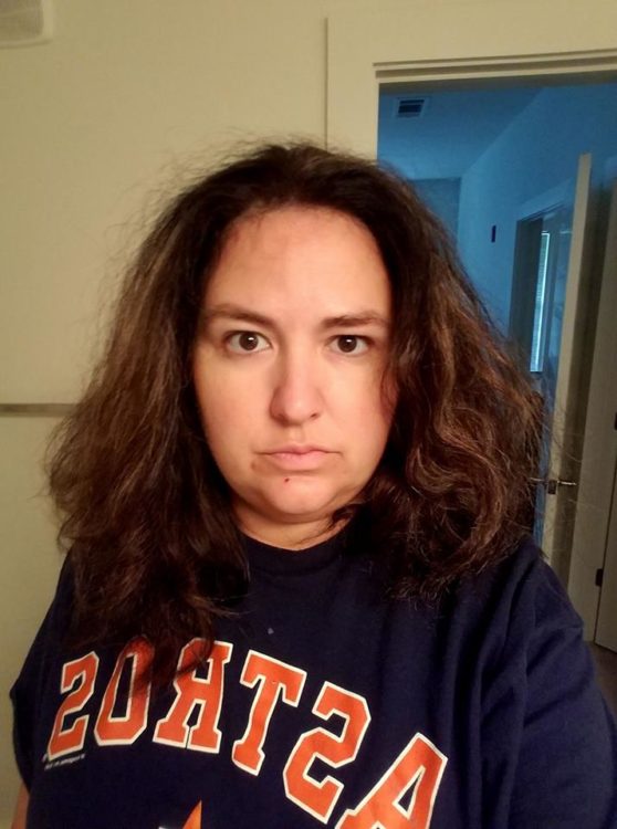 woman in t-shirt with unbrushed hair