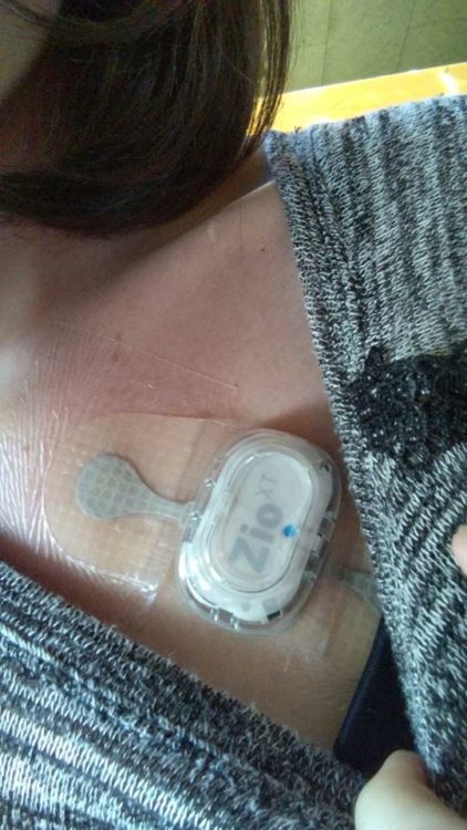 woman with a heart rate monitor on her chest