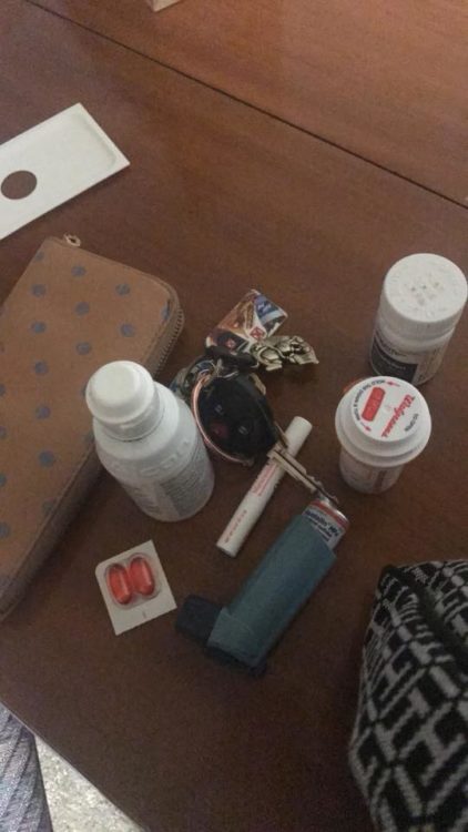 pill bottles, keys and wallet