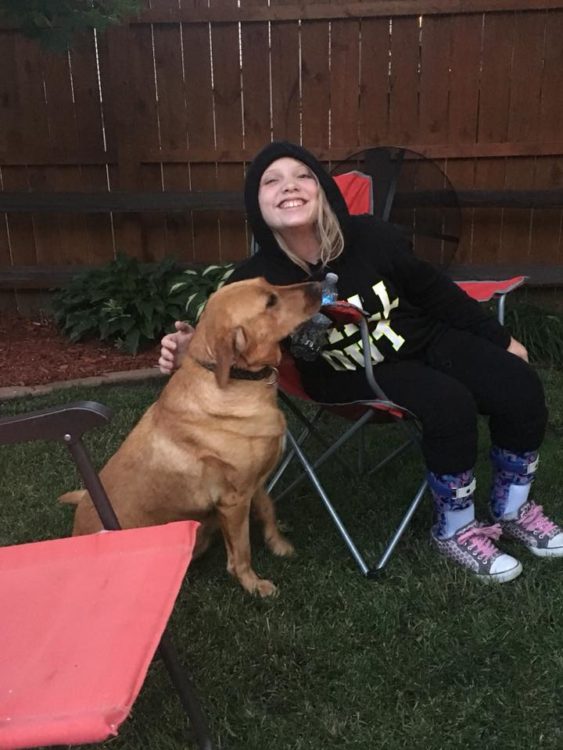 Teenage girl with her dog