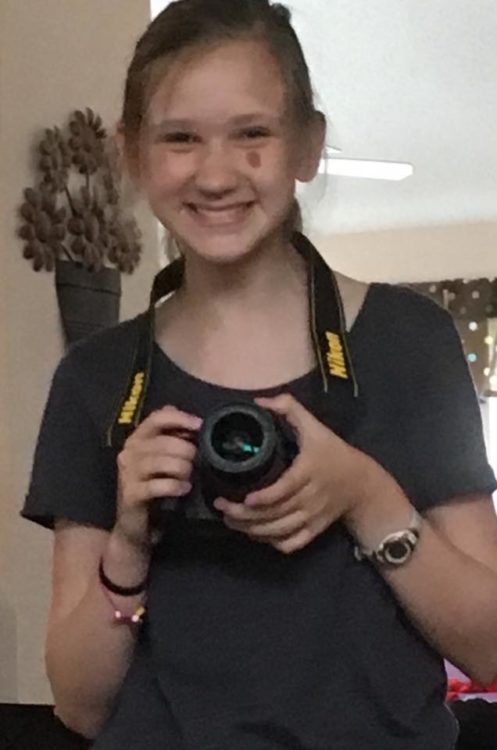 Girl holding camera