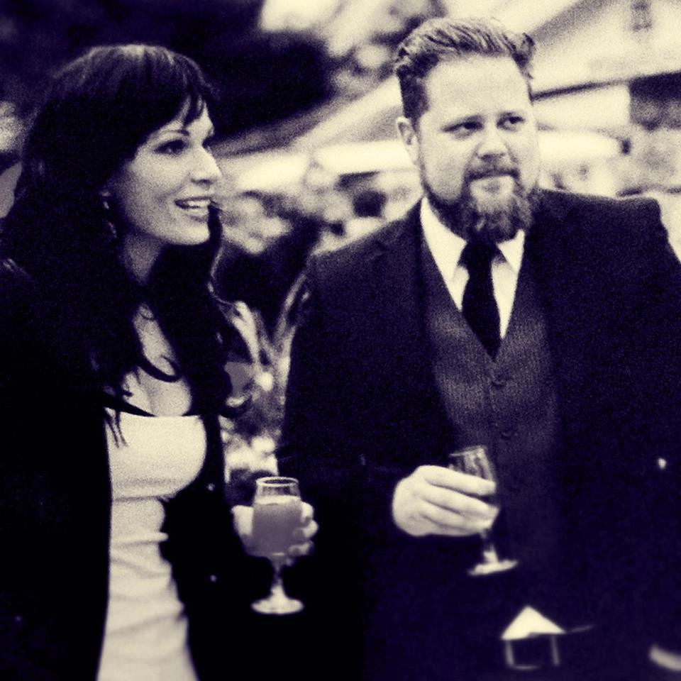 The writer and her partner at a wedding.