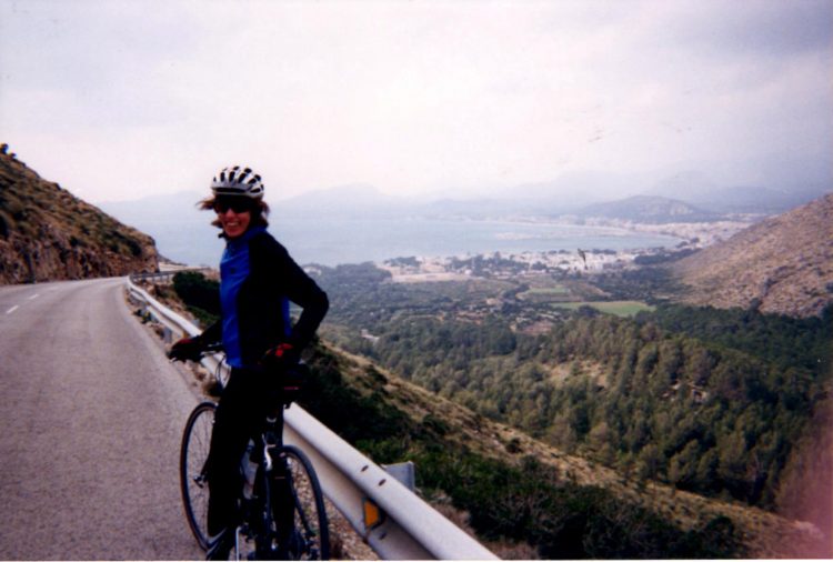 woman biking in mallorca, spain