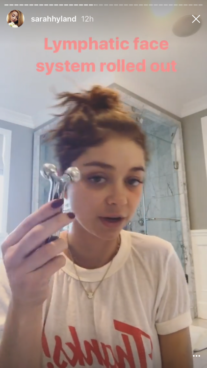 sarah hyland shows the rolling massage tool she uses on her face