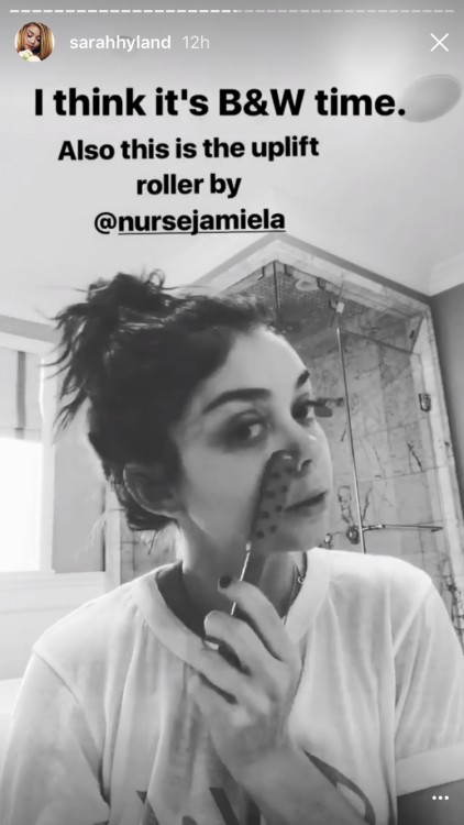sarah hyland showing a facial roller she uses on her face with the caption I think it's b&w time. also this is the uplift roller by nurse jamie la