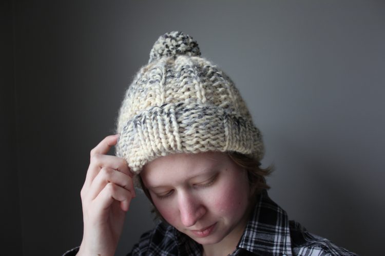 woman wearing a knit hat