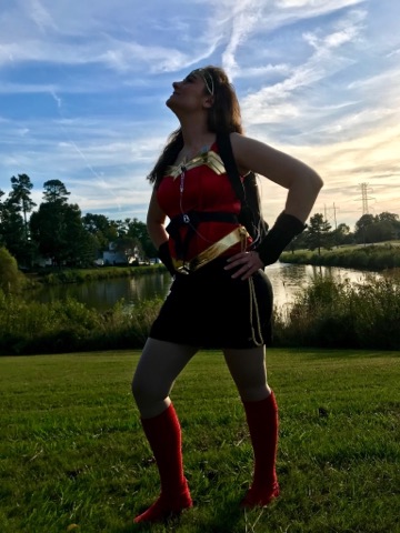 woman dressed as superhero