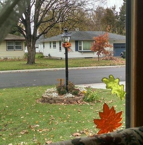 A view outside the writer's window, showing her lamp post and front yard.