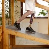 Male prosthesis wearer training on slopes