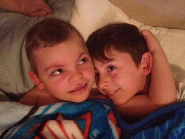 two brothers hugging