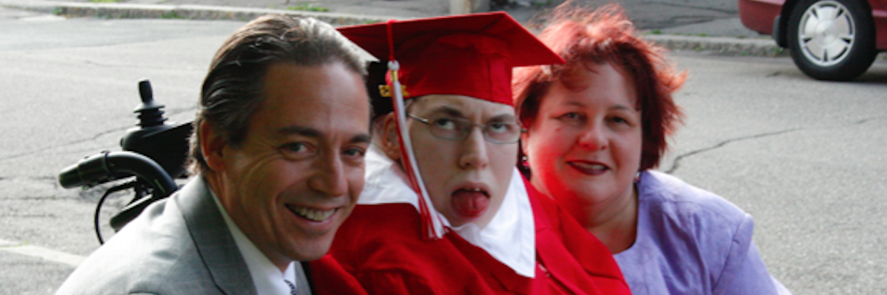 What I Wish I Knew the Day My Son With Special Needs Was Born Michael and his wife with their son on his graduation day