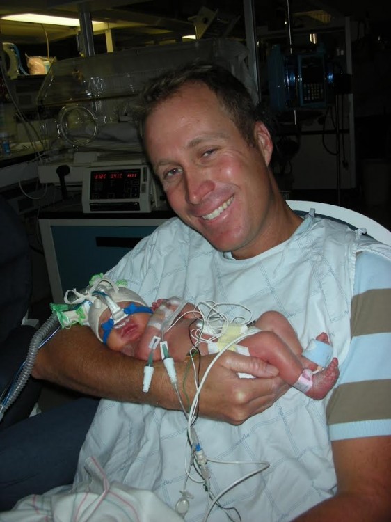 Richard Laver with baby Kate the day after her birth.