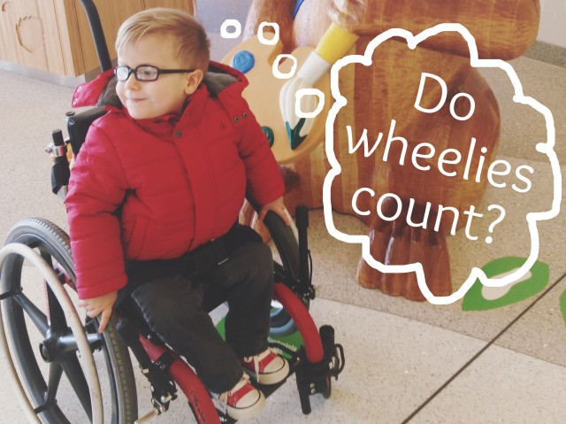 A photo of the author's son in a wheelchair with the thought bubble, "Do wheelies count?"