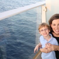 mom and her young son on a boat