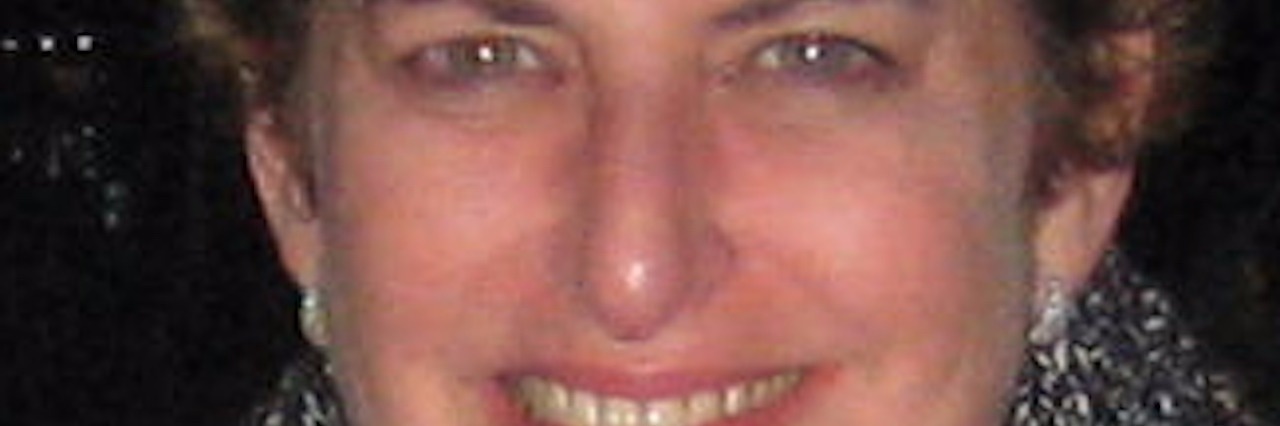 Quality of Life After Multiple Sclerosis Diagnosis cathy wearing a scarf and smiling