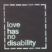 sign saying "Love Has No Disability"