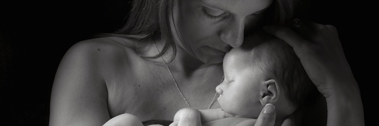 Now I Lay Me Down To Sleep: Haggards' Group for Myotubular Myopathy Woman holding baby