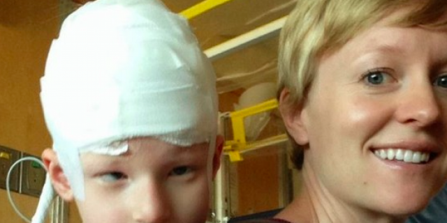 Why We're Starting Our Daughter on Medical Marijuana Mother carrying daughter (girl with head wrapped in bandages) on her back at hospital