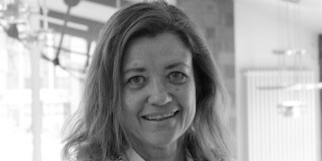 It's Time for My Rare Disease to Show Itself to the World an upclose, profile photo of a smiling woman