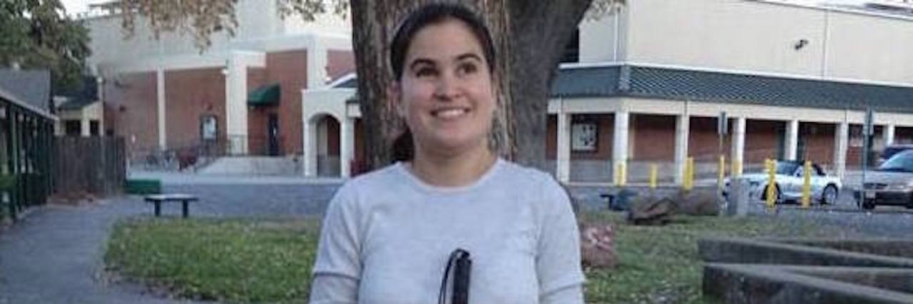 Teacher Shares Uplifting Secret With Visually Impaired Girl woman with rainbow cane