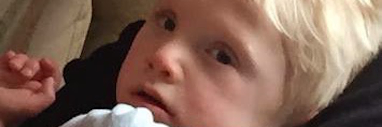 What Life Is Like When Your Child Is Undiagnosed Small boy lying down