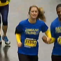 A man and woman running in a marathon