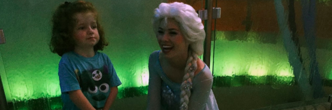 Our Special Needs Family's Magical Trip to Disneyland young girl with elsa from frozen at disneyland