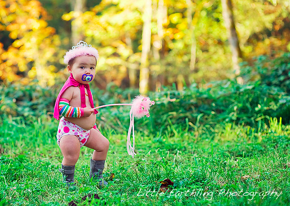 Victoria wearing a pink tiara and carrying a pink wand