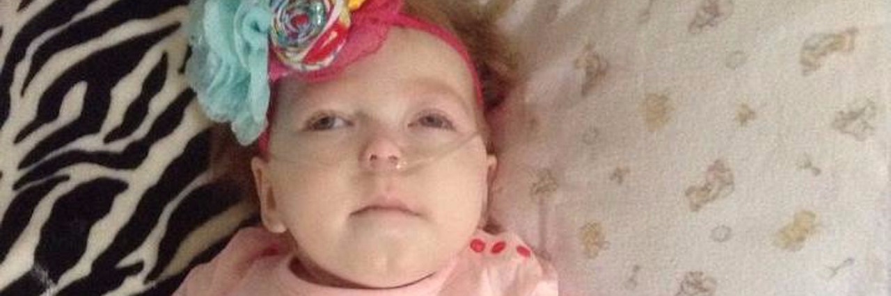 Mother's Last Moments With Daughter With Krabbe Disease hannah with oxygen tubes