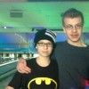 two boys at a bowling alley