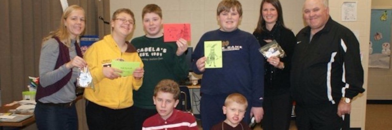 When a Classmate Taunted a Fellow Student With Autism group of special needs students smiling at school