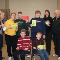 group of special needs students smiling at school