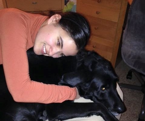 blind woman hugging dog