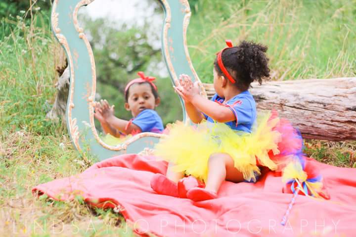 young girl in snow white costume