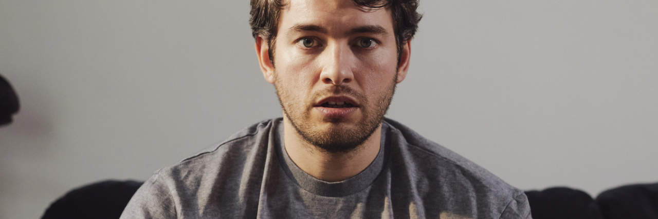 What Anxiety Feels Like photo of a young person looking into the camera with anxious expression