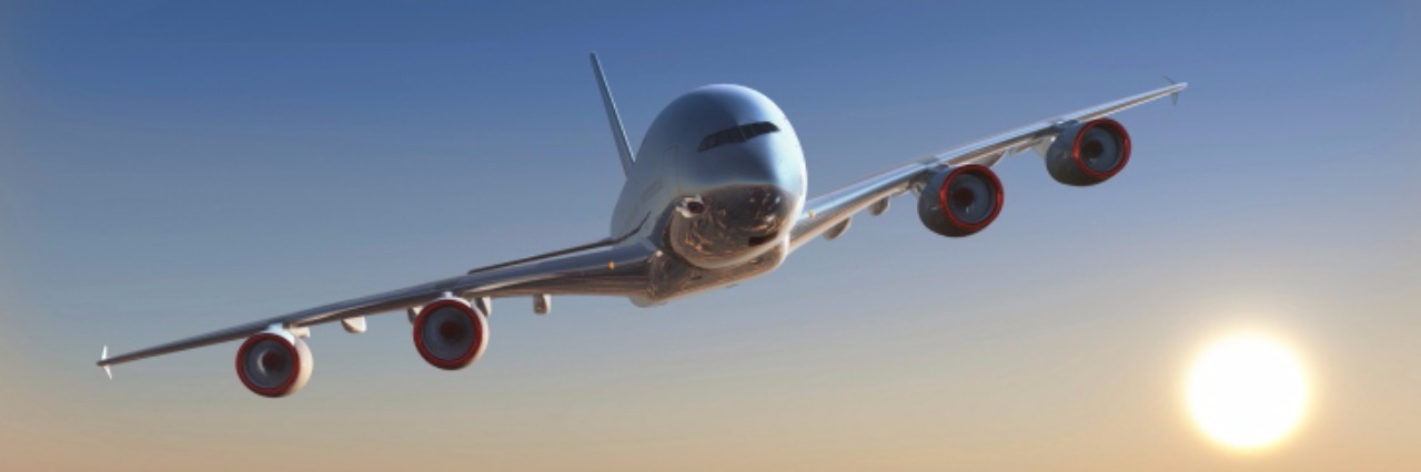 Best Airline Accommodations for People With Autism plane flying above clouds