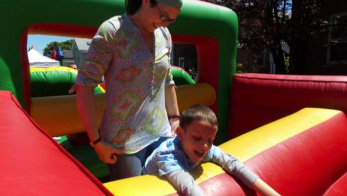 mom and son in bouncy house