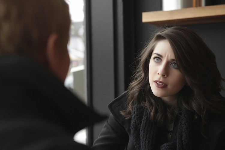 upset woman in cafe having conversation