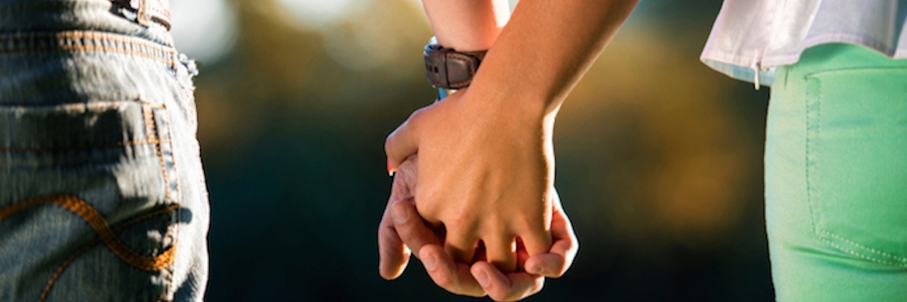 Ways to Support a Partner Living With Depression couple holding hands