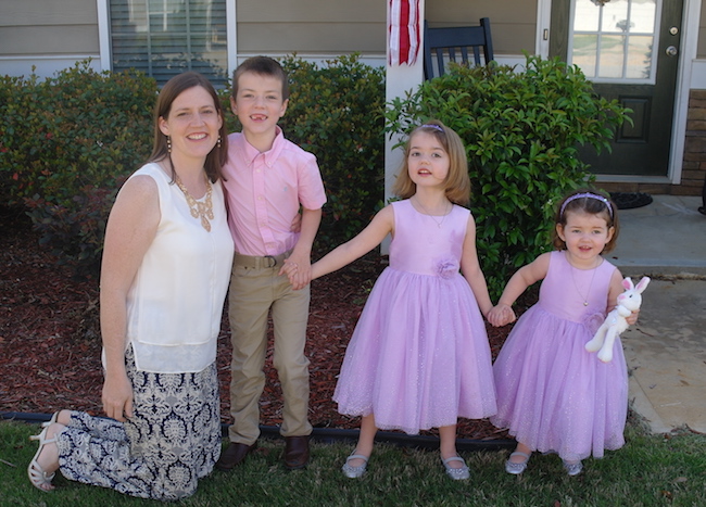 mother and her three children outside