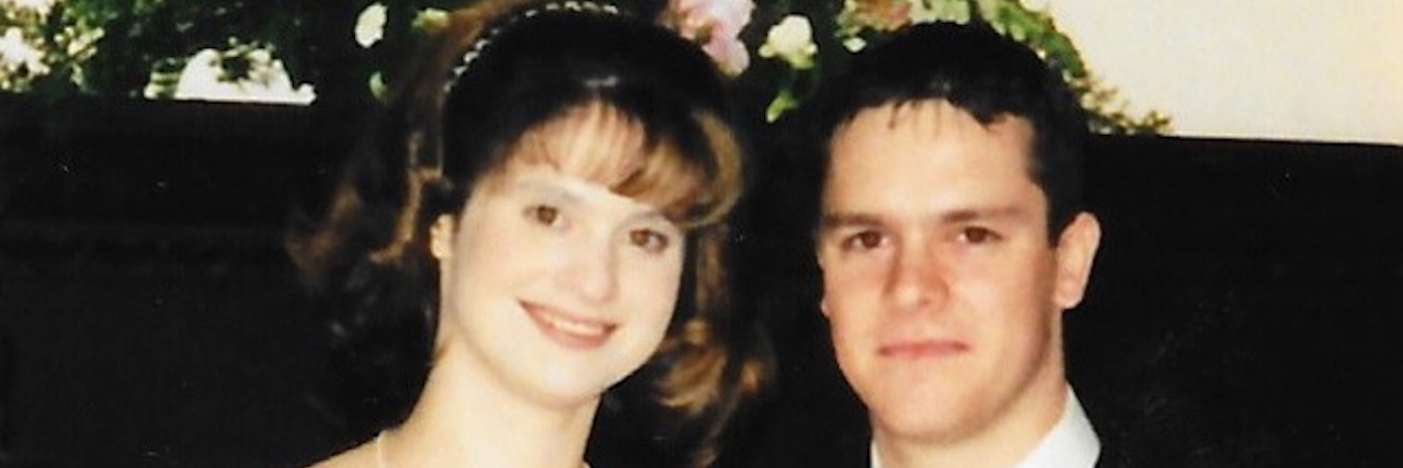 What It Means to Be There 'for Worse' When You Have a Sick Child wedding photo of husband and wife with cap sleeve gown