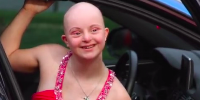 Delaware Police Help Victoria Marsh, Girl With Cancer, Meet Taylor Swift Young woman with bald head smiling while wearing a prom dress